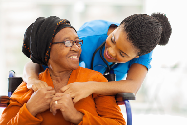 Nurse smiling at patient