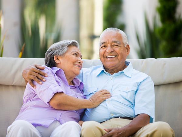 Smiling elderly couple